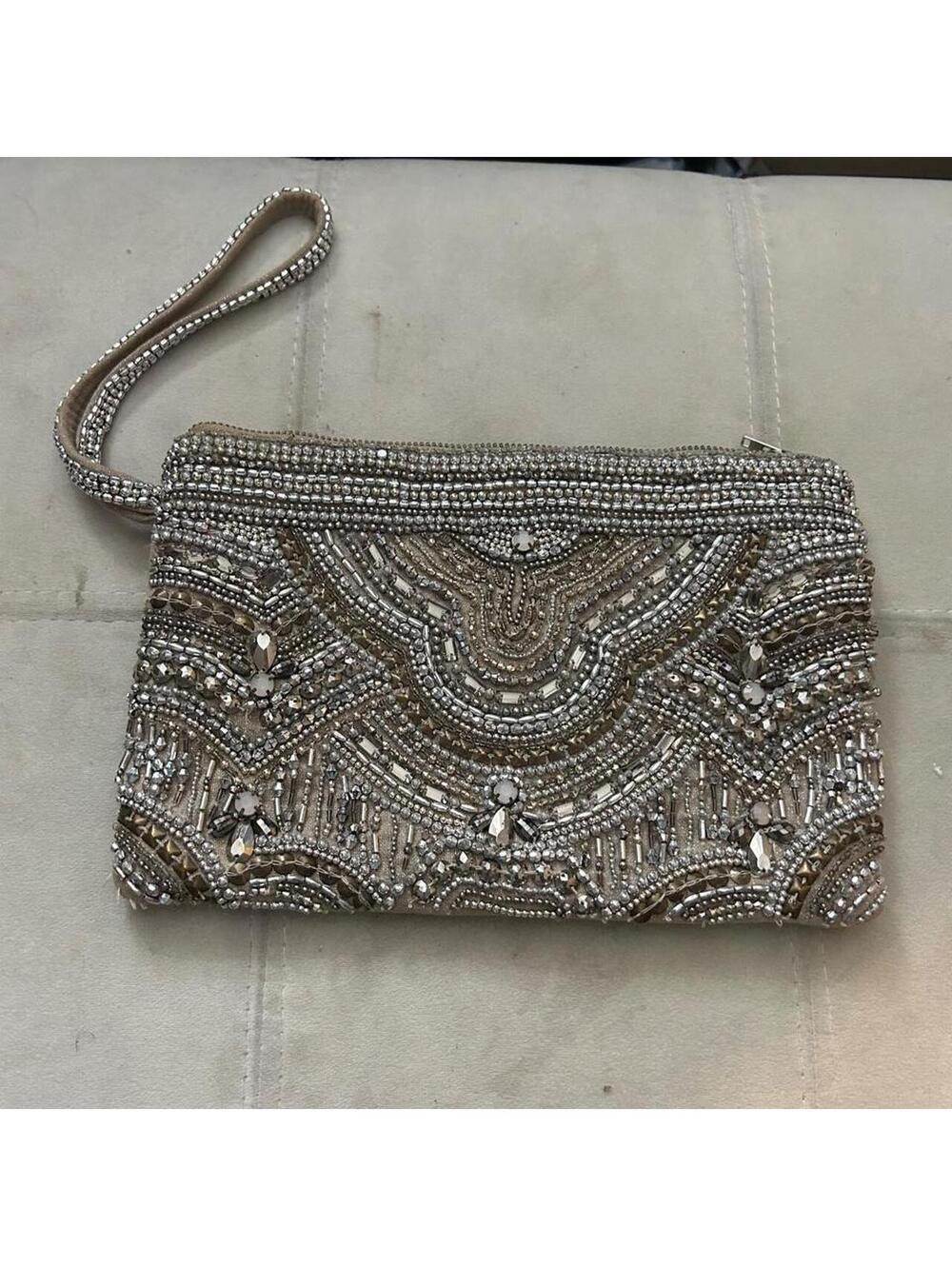 Chico's silver beaded clutch with wrist strap